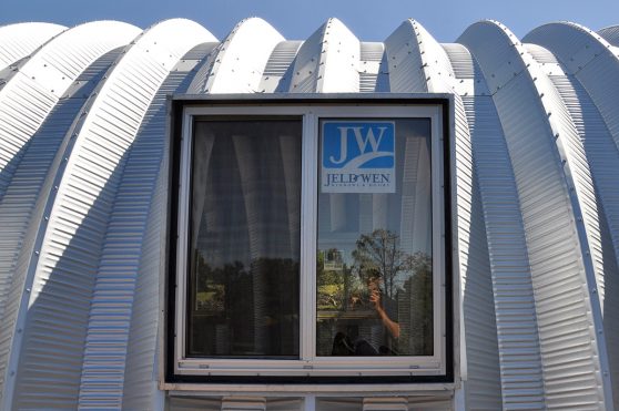 Clever Moderns Quonset hut house construction window installation