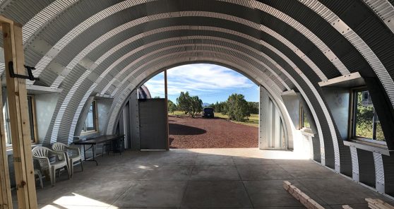 Clever Moderns Quonset hut house construction window installation